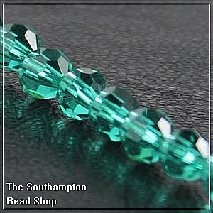 Chinese 4mm Round Crystals - Blue Zircon